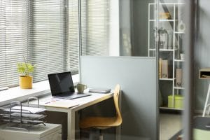Chi Phí Xây Dựng Nhà Văn Phòng: Hướng Dẫn Ngân Sách Hợp Lý 1 workplace arrangement with laptop